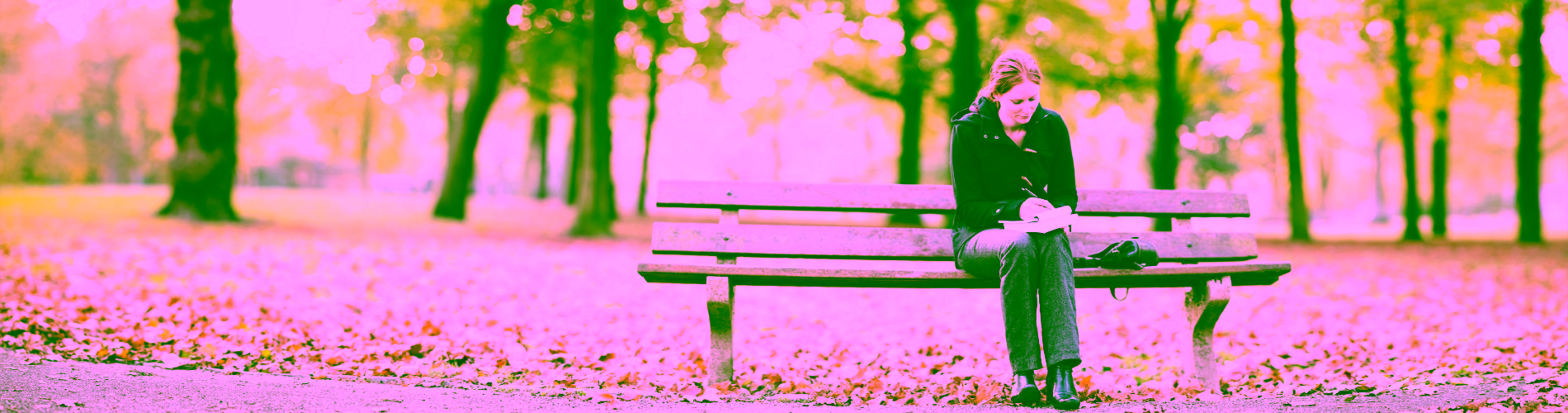 Woman sitting on a park bench